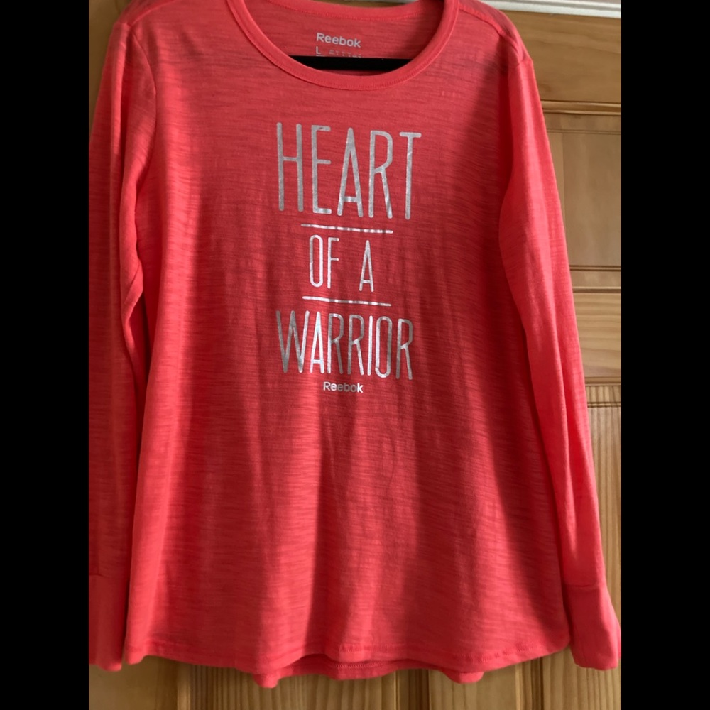 Woman’s Reebok heart of a warrior tee shirt